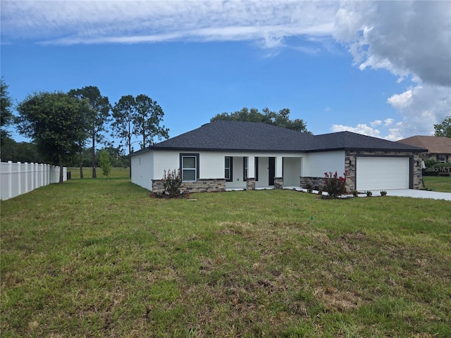 5555 Baffin Cir, Spring Hill, FL 34606 - view of front of house with stone siding, an attached garage, driveway, and stucco siding