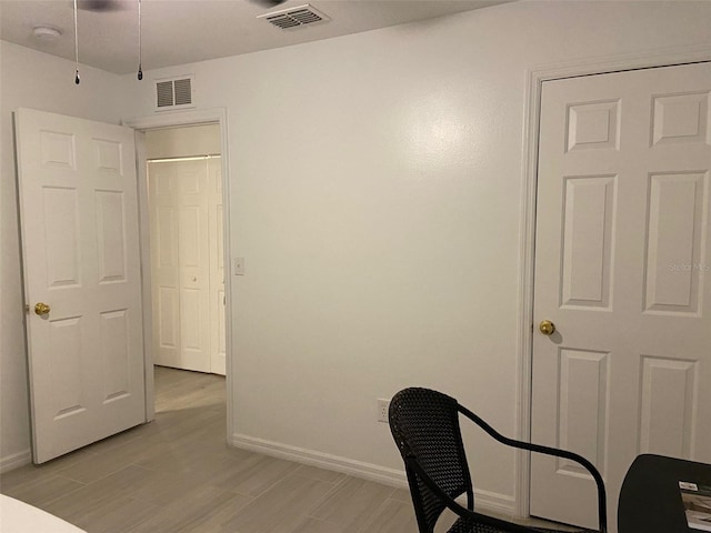 12419 Lamont Ave, New Port Richey, FL 34654 - home office with baseboards and light wood-style floors
