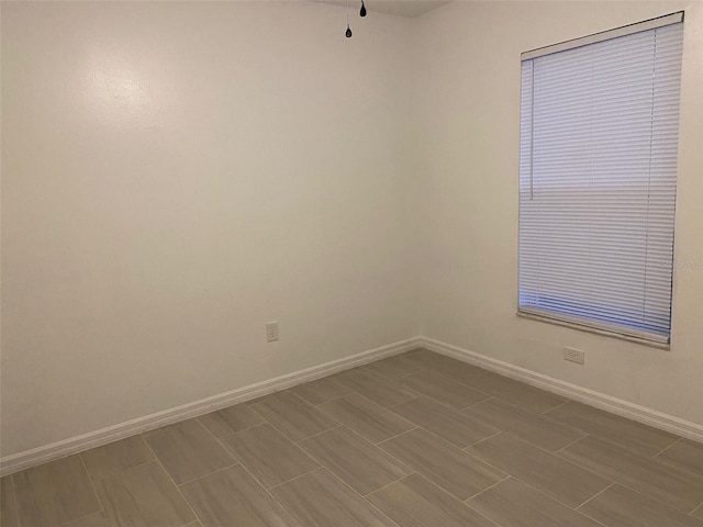 12419 Lamont Ave, New Port Richey, FL 34654 - empty room with baseboards