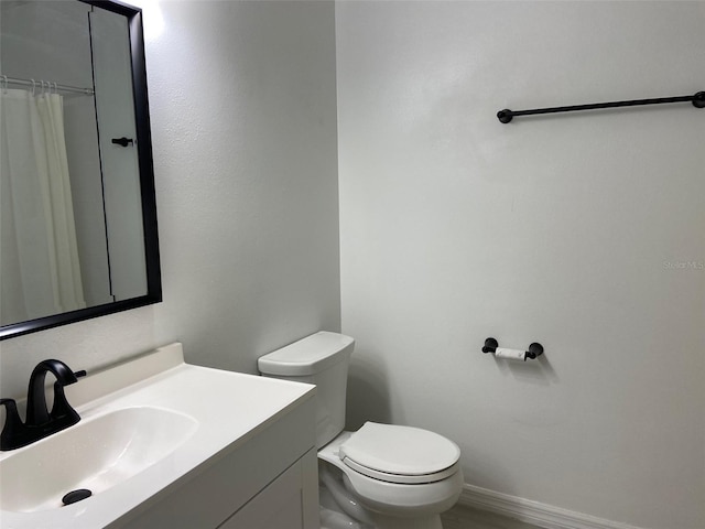 12419 Lamont Ave, New Port Richey, FL 34654 - full bathroom featuring toilet and vanity