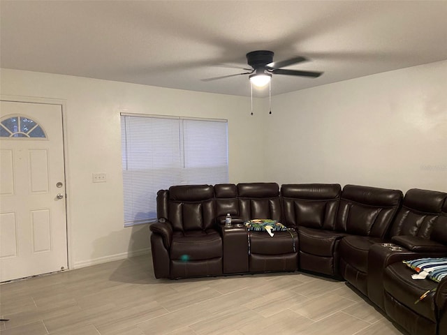 12419 Lamont Ave, New Port Richey, FL 34654 - living room with a ceiling fan and light wood-style floors