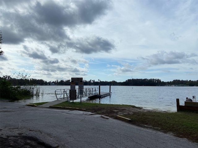 12419 Lamont Ave, New Port Richey, FL 34654 - dock area with a water view and a boat ramp