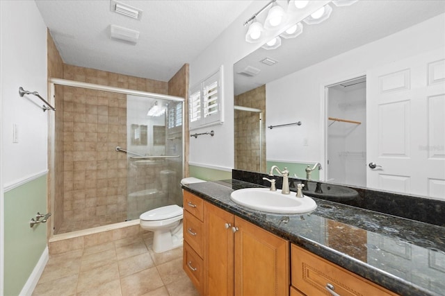 4439 Reeves Rd, New Port Richey, FL 34652 - full bath with a shower stall, vanity, and tile patterned flooring