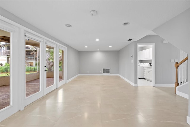4439 Reeves Rd, New Port Richey, FL 34652 - unfurnished room with washer / dryer, stairs, recessed lighting, a smoke detector, and light tile patterned flooring