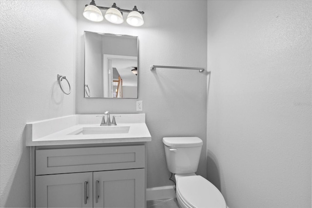 4439 Reeves Rd, New Port Richey, FL 34652 - half bathroom featuring toilet and vanity