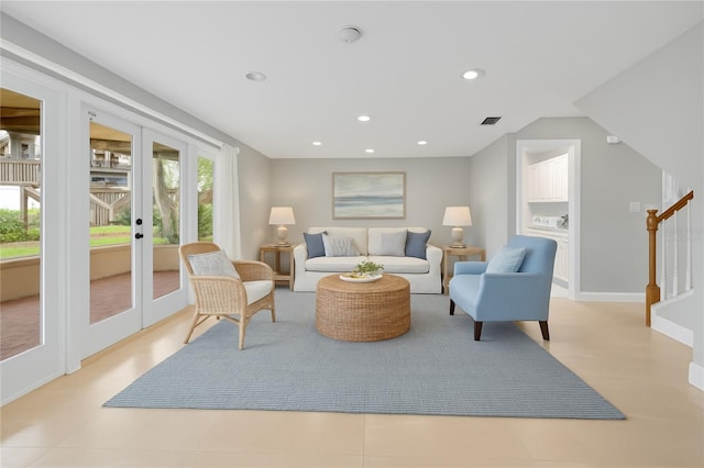 4439 Reeves Rd, New Port Richey, FL 34652 - living area with french doors, healthy amount of natural light, stairs, and recessed lighting