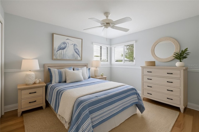 4439 Reeves Rd, New Port Richey, FL 34652 - bedroom featuring light wood-type flooring and a ceiling fan
