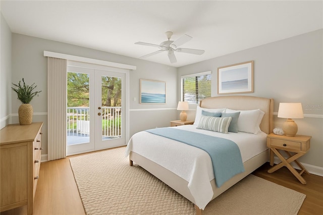 4439 Reeves Rd, New Port Richey, FL 34652 - bedroom with access to exterior, light wood-style flooring, a ceiling fan, and french doors