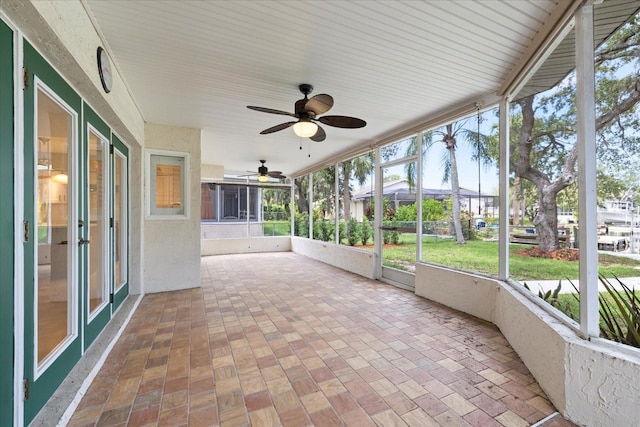4439 Reeves Rd, New Port Richey, FL 34652 - unfurnished sunroom featuring ceiling fan