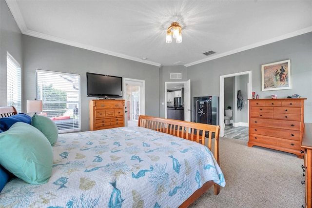 9309 Edistro Pl, New Port Richey, FL 34654 - bedroom featuring carpet, ornamental molding, and ensuite bath