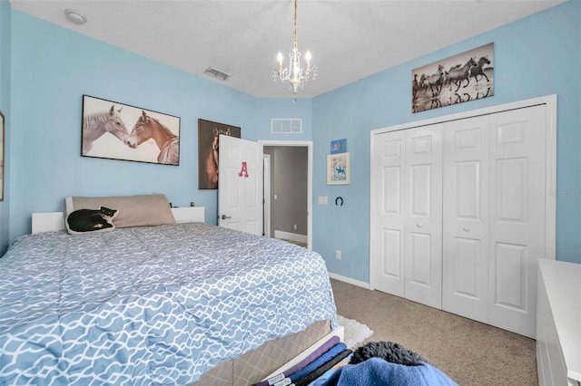 9309 Edistro Pl, New Port Richey, FL 34654 - bedroom with carpet, a chandelier, and a closet
