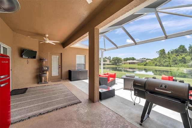 9309 Edistro Pl, New Port Richey, FL 34654 - view of patio / terrace featuring a water view, an outdoor living space, a ceiling fan, and a lanai
