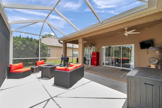 9309 Edistro Pl, New Port Richey, FL 34654 - view of patio / terrace with an outdoor living space with a fire pit, ceiling fan, and a lanai