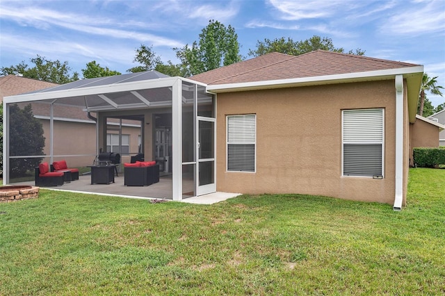 9309 Edistro Pl, New Port Richey, FL 34654 - rear view of house with an outdoor hangout area, stucco siding, a patio, and a lawn