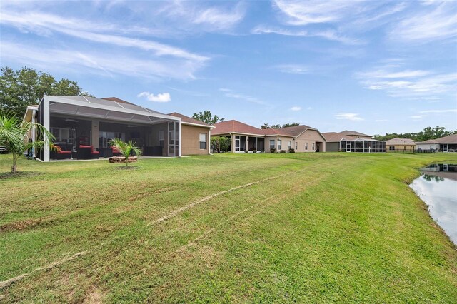 9309 Edistro Pl, New Port Richey, FL 34654 - view of green lawn with glass enclosure