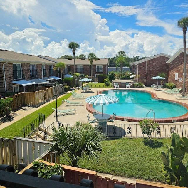 2200 S Palmetto Ave Unit E050, South Daytona, FL 32119 - community pool featuring a patio