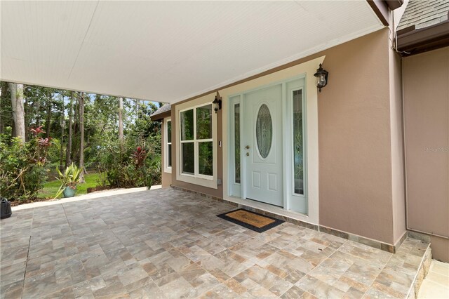 2202 Amity Ct, New Port Richey, FL 34655 - view of exterior entry with stucco siding