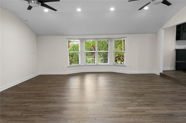 2202 Amity Ct, New Port Richey, FL 34655 - unfurnished living room with ceiling fan, vaulted ceiling, recessed lighting, and dark wood-style floors
