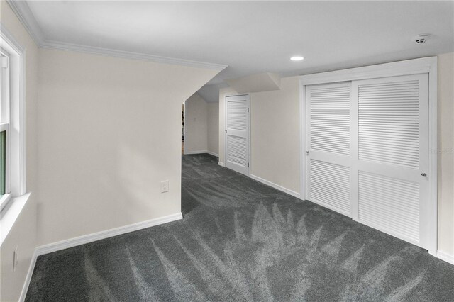2202 Amity Ct, New Port Richey, FL 34655 - additional living space with dark carpet and recessed lighting