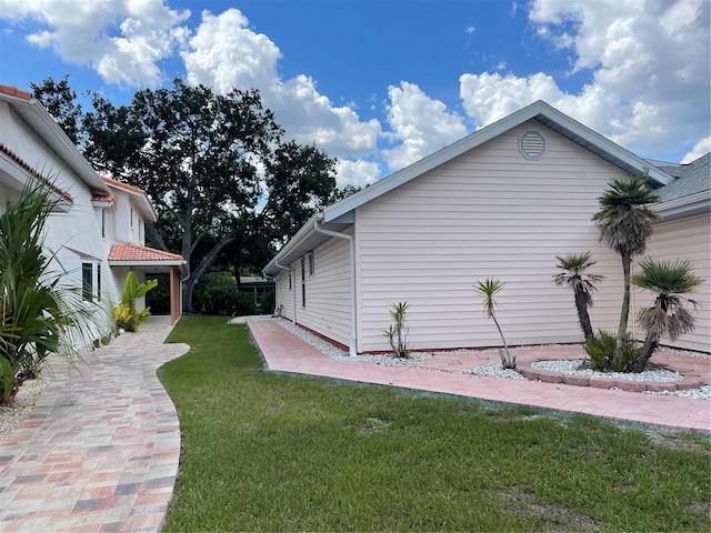 20971 Negril Ct, Lutz, FL 33558 - view of home's exterior featuring a yard