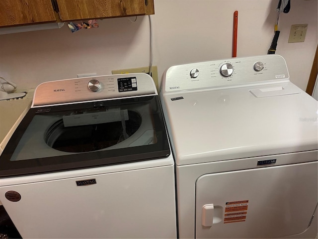 20971 Negril Ct, Lutz, FL 33558 - laundry room featuring cabinet space and independent washer and dryer
