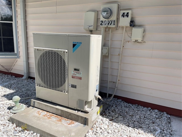 20971 Negril Ct, Lutz, FL 33558 - exterior view of an ac unit and electric meter