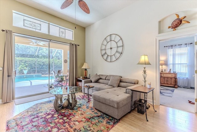 9406 Burnam Dr, Weeki Wachee, FL 34613 - living room with ceiling fan and wood finished floors