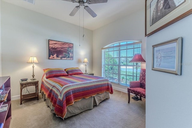 9406 Burnam Dr, Weeki Wachee, FL 34613 - carpeted bedroom featuring baseboards and ceiling fan