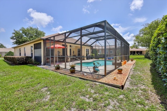 9406 Burnam Dr, Weeki Wachee, FL 34613 - outdoor pool with a lawn, a patio area, and glass enclosure
