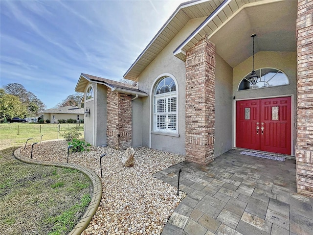 10060 Chip Ln, New Port Richey, FL 34654 - view of exterior entry with stucco siding