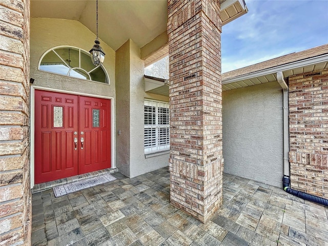 10060 Chip Ln, New Port Richey, FL 34654 - view of exterior entry with stucco siding