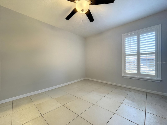 10060 Chip Ln, New Port Richey, FL 34654 - empty room with healthy amount of natural light, a ceiling fan, and light tile patterned flooring