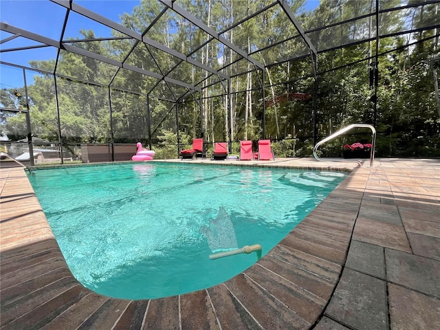 10060 Chip Ln, New Port Richey, FL 34654 - outdoor pool with a patio area and a lanai