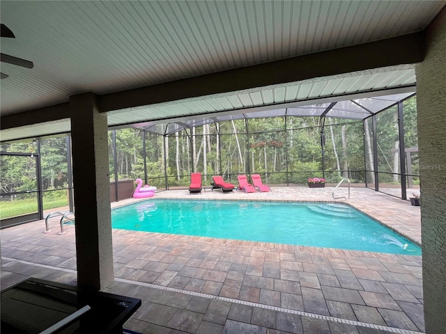 10060 Chip Ln, New Port Richey, FL 34654 - swimming pool featuring a patio area and a lanai