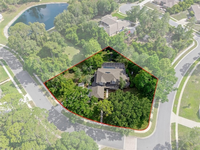 7268 Crystal Spring Run, Weeki Wachee, FL 34607 - aerial perspective of suburban area featuring a large body of water and property parcel outlined
