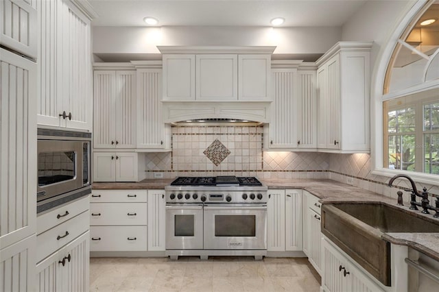 7268 Crystal Spring Run, Weeki Wachee, FL 34607 - kitchen with stainless steel appliances, tasteful backsplash, light stone countertops, and recessed lighting