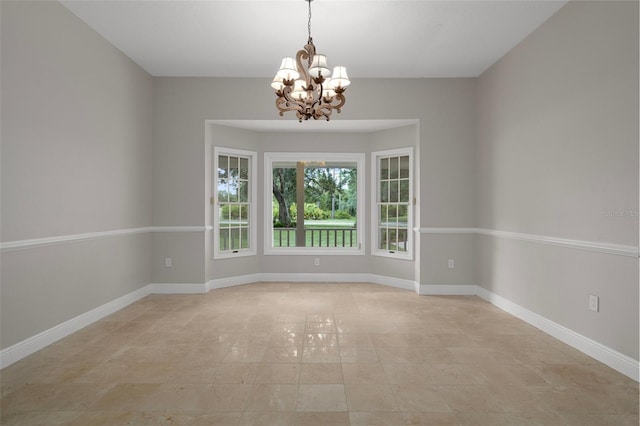 7268 Crystal Spring Run, Weeki Wachee, FL 34607 - spare room with a chandelier and light tile patterned floors