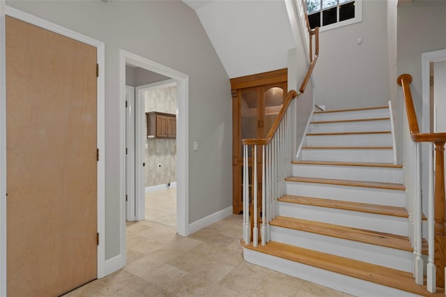 7268 Crystal Spring Run, Weeki Wachee, FL 34607 - stairway featuring vaulted ceiling
