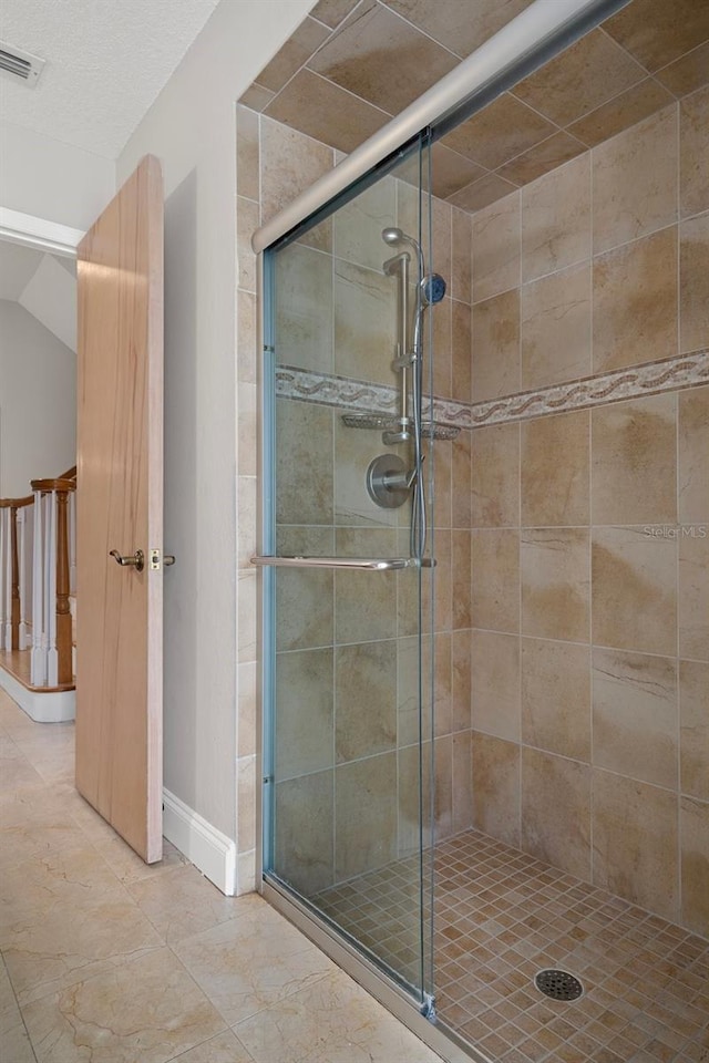 7268 Crystal Spring Run, Weeki Wachee, FL 34607 - full bath featuring a shower stall and vaulted ceiling