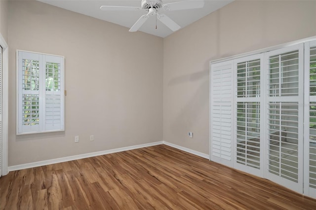 7268 Crystal Spring Run, Weeki Wachee, FL 34607 - spare room featuring wood finished floors and ceiling fan