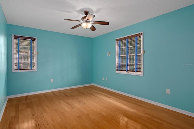 7268 Crystal Spring Run, Weeki Wachee, FL 34607 - unfurnished room with a ceiling fan and wood finished floors