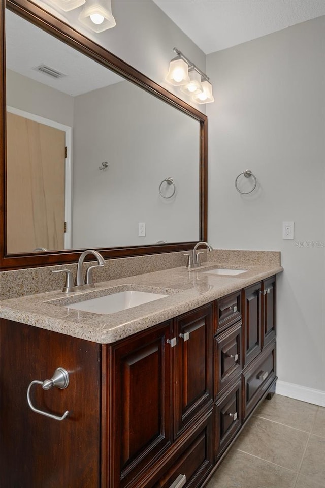 7268 Crystal Spring Run, Weeki Wachee, FL 34607 - full bath featuring double vanity and tile patterned flooring
