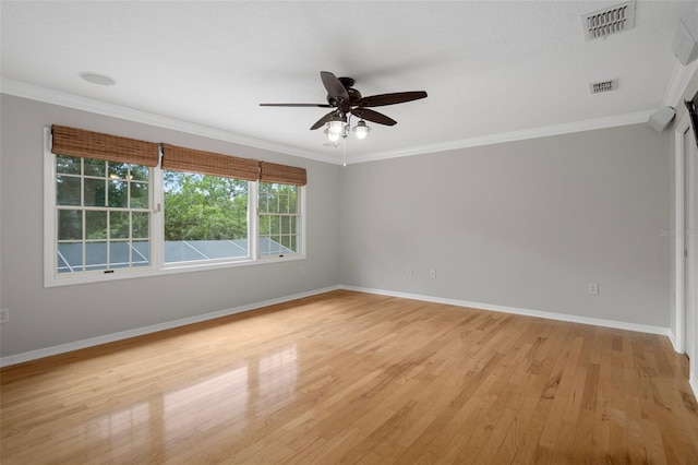 7268 Crystal Spring Run, Weeki Wachee, FL 34607 - spare room featuring light wood-style floors, a ceiling fan, and ornamental molding