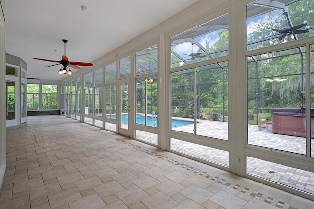 7268 Crystal Spring Run, Weeki Wachee, FL 34607 - unfurnished sunroom featuring a jacuzzi and ceiling fan