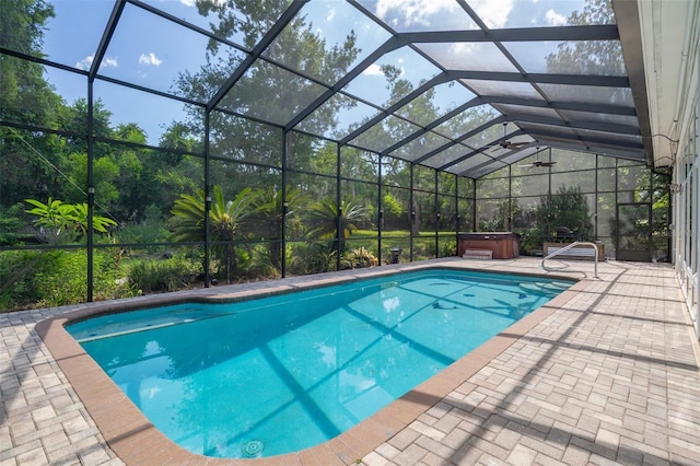 7268 Crystal Spring Run, Weeki Wachee, FL 34607 - swimming pool featuring a hot tub, a patio, and glass enclosure