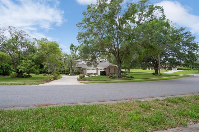 7268 Crystal Spring Run, Weeki Wachee, FL 34607 - view of asphalt street featuring curbs and sidewalks
