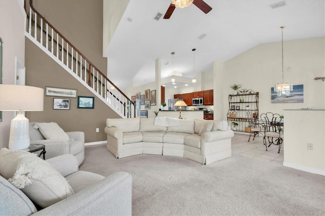 11418 Tee Time Cir, New Port Richey, FL 34654 - living area with light colored carpet, high vaulted ceiling, ceiling fan, stairway, and a chandelier