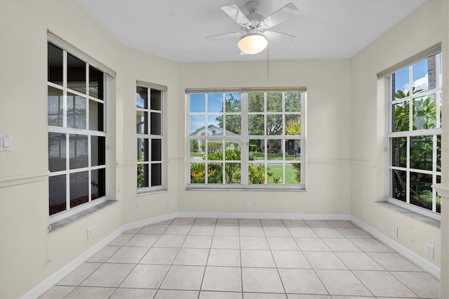 11418 Tee Time Cir, New Port Richey, FL 34654 - unfurnished sunroom with baseboards