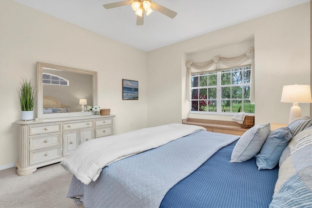 11418 Tee Time Cir, New Port Richey, FL 34654 - bedroom featuring light carpet and a ceiling fan