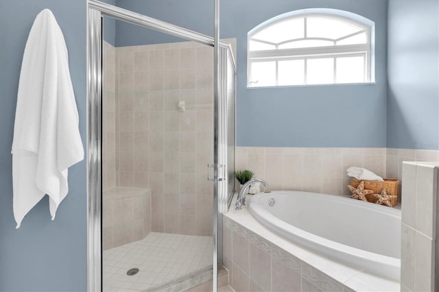 11418 Tee Time Cir, New Port Richey, FL 34654 - full bathroom featuring a garden tub and a stall shower